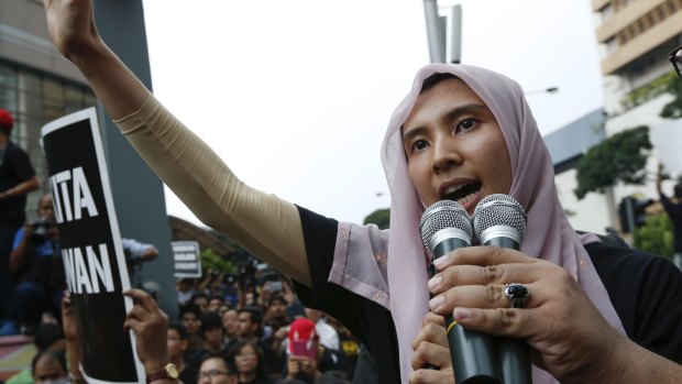 Nurul Izzah speaks at a protest rally on March 7 demanding her father's freedom.