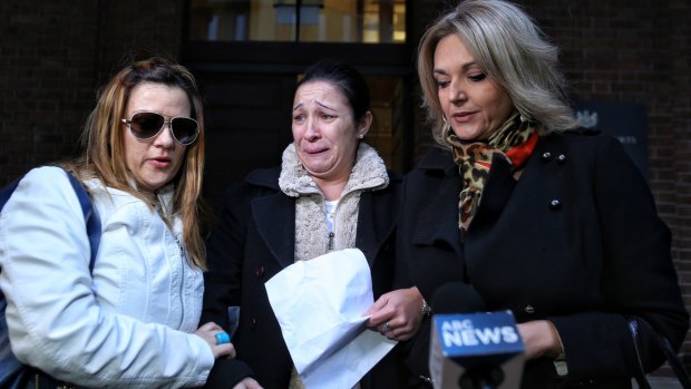 Friends of Victoria Comrie Cullen (from left) Neke Rezitis, Renee Jomaa and Christina Arciuli make a statement after Christopher Cullen was found guilty.