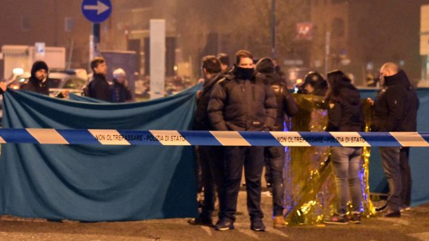 Italian police cordon off an area around the body of terror suspect Anis Amri. 