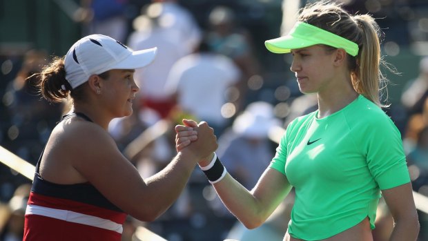 Run continues: Canada's Eugenie Bouchard congratulates Ashleigh Barty after the Australian won in three sets in the Miami Open.