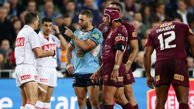 No try: Robbie Farah speaks to referee Gerard Sutton after the bunker decision to deny Josh Morris a try.