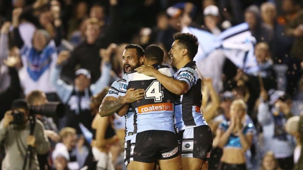 Great escape: Jayson Bukuya and the Sharks celebrate a miraculous win.