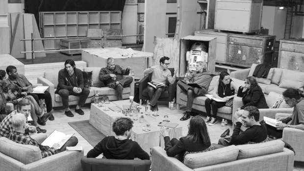 Down to business: J.J. Abrams with cast members.