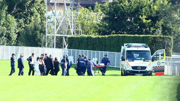 Jockey Kathy O'Hara is put into an ambulance after falling from Single Gaze during the Australian Oaks at Randwick.