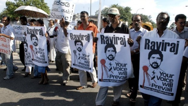 Sri Lankans protesting the 2006 shooting death of Tamil politician and human rights lawyer Nadarajah Raviraj in Sri Lanka. 