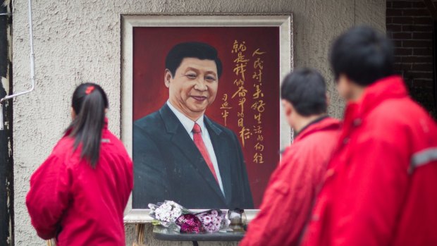 A painting of Xi Jinping on a Shanghai street.