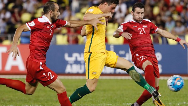 Bursting through: Socceroos striker Tomi Juric.