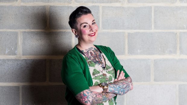 Polly McGee works for a tech company and says her tattoos tend to disarm people.