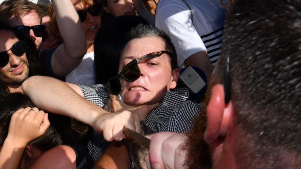 Anti-racist activists disrupt the Q Society fundraiser in St Kilda, Melbourne, where Cory Bernardi was to speak after his split from the Liberal Party alongside Liberal MP George Christensen. 