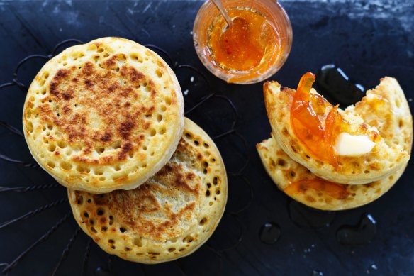 Buttered crumpets with grapefruit and cardamom marmalade (recipe below).