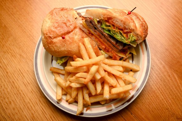 Steak sandwich with chutney and cheese (and chips).