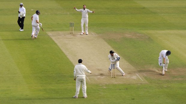 Adam Lyth (right) is run out by New Zealand's Trent Boult.