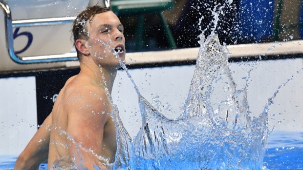 Surprise victory: Kyle Chalmers celebrates winning gold.