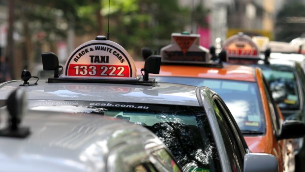 A Brisbane taxi company owner has admitted online he bashed an Uber driver.