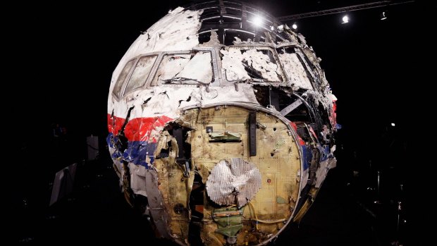 The ripped, wrecked remains of flight MH17.