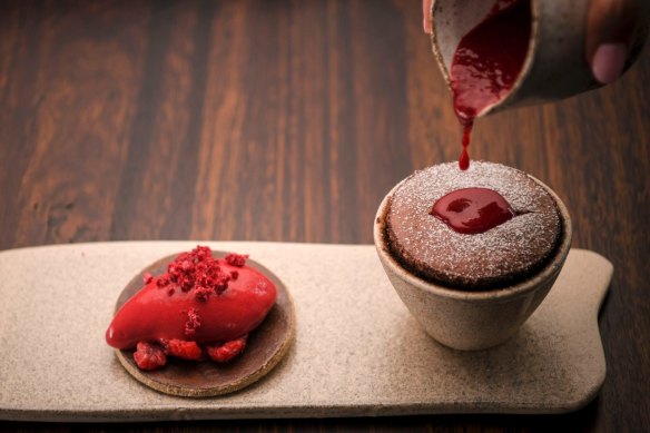 Valrhona souffle with raspberry sorbet.