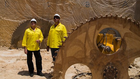 A massive saw is used to cut the sandstone into blocks before they are extracted and transported out of the quarry.