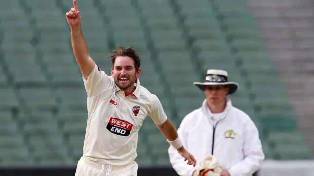 Got him: South Australian bowler Chadd Sayers celebrates the dismissal of Aaron Finch.