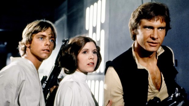 Mark Hamill, Carrie Fisher and Harrison Ford in <em>Star Wars.</em>