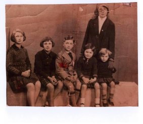 Ms Field as a child (far right) with her beloved nanny, who took the place of her emotionally distant mother.