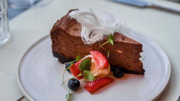 Chocolate malt cheesecake with mascarpone, berries and fairy floss.