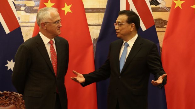 Malcolm Turnbull with Chinese Premier Li Keqiang during a signing ceremony at the Great Hall of the People in Beijing.