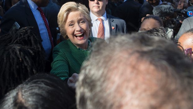Hillary Clinton campaigning in North Carolina: Her disapproval rating is around 55 percent.