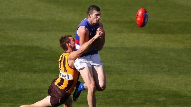 Sidelined: New Suns' recruit Jarrad Grant, pictured while playing for Western Bulldogs, is expected back at training as early as next week.