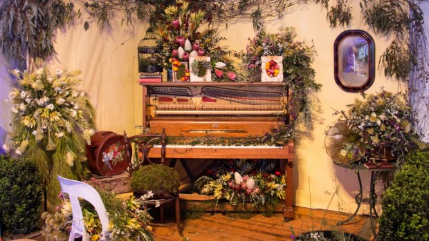 A salvaged piano stars in the display by CIT students at the Floral Emporium Tent at Floriade.