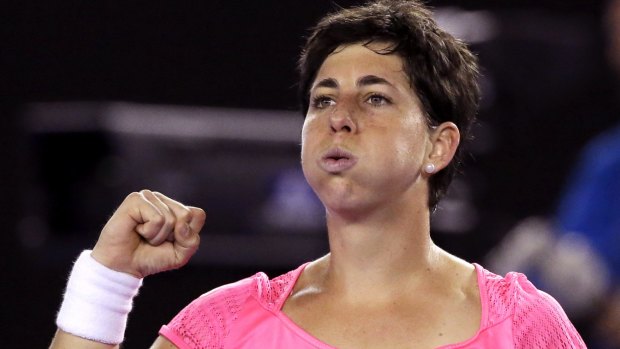 Winning way: Carla Suarez Navarro of Spain celebrates after beating Australia's Daria Gavrilova.