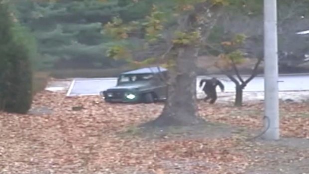 Surveillance video shows a North Korean soldier running from a jeep as he defects. He was later shot by North Korean soldiers.