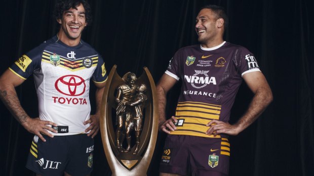 It's on: Johnathan Thurston and Justin Hodges pose with the trophy.