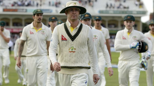 On shaky ground: Michael Clarke leads his team off the field after the opening day debacle at Trent Bridge.

