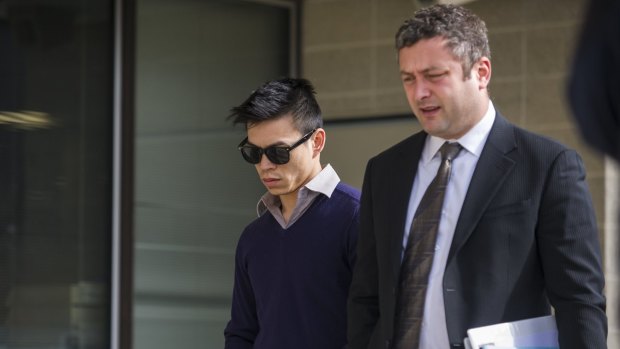 Stanley Hou, left, at the ACT Magistrates Court on an earlier occasion, with lawyer Kamy Saeedi.