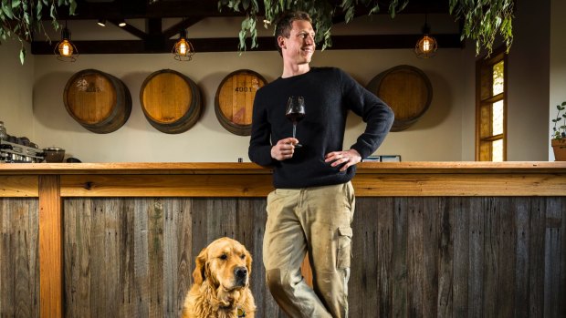 Taste test: Tiger Dylan Grimes at Mount Macedon Winery, which he purchased last year. 