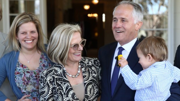 Mr Turnbull at Government House with his daughter Daisy, wife Lucy and grandson Jack.