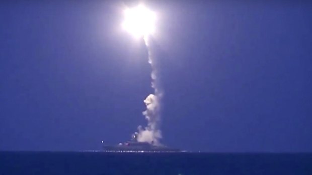 A Russian warship launches a cruise missile in the Caspian Sea in October.
