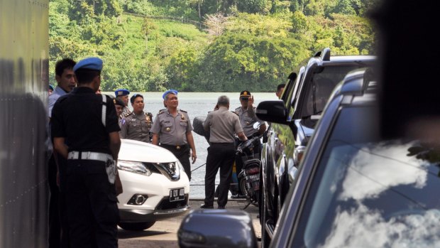 Police oversee preparations for the executions in Cilacap, the closest town to Nusakambangan where the prisoners will be shot.

