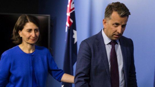 Premier Gladys Berejiklian and Transport Minister Andrew Constance leave a press conference on Thursday afternoon.