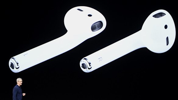 Tim Cook shows off the wireless AirPods during the Apple event in San Francisco, California.