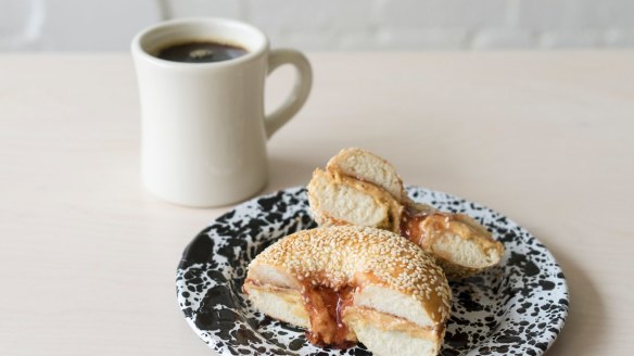 Sesame seed bagel with raspberry jam and a filter coffee at Mile End, Fitzroy.