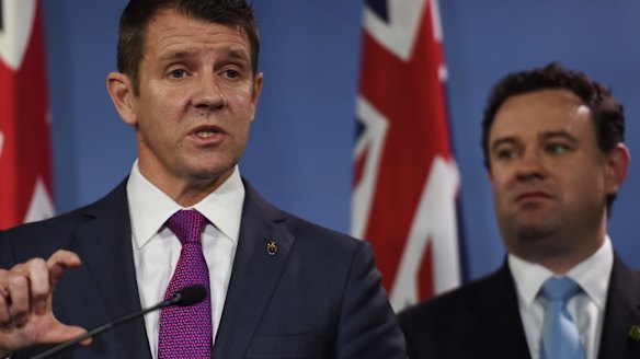 Premier Mike Baird and Sports Minister Stuart Ayres when they announced the $1.6 billion stadium plan last September, elements of which continue to change.