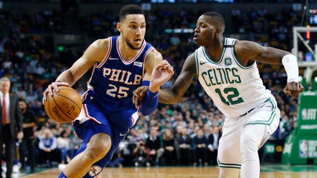 Contained: Ben Simmons drives past Boston Celtics' Terry Rozier.