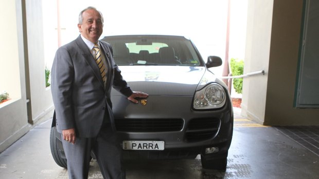 Former Parramatta Leagues Club chairman Roy Spagnolo with his car, sporting the Parra numberplate.