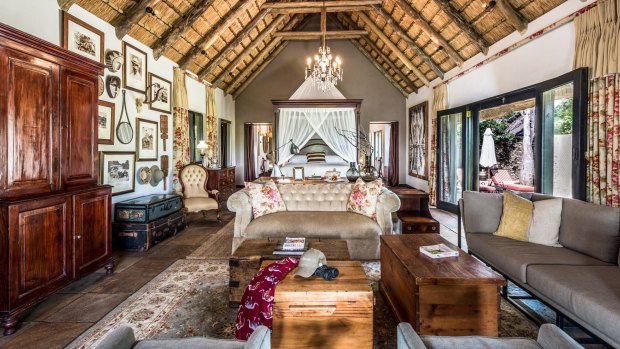 The Ivory Presidential Suite has a four-poster bed, a Chesterfield lounge with floral covered cushions, and an outdoor bath so you can sit back, soak and spy wandering wildlife.