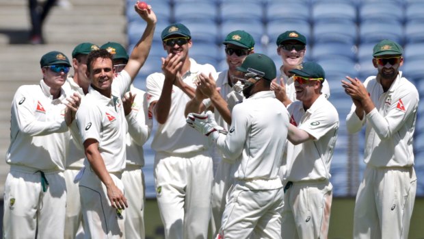 Star turn: Steve O'Keefe celebrates his fifth wicket after dismissing Ravindra Jadeja.