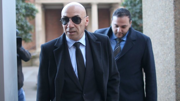 Eddie Obeid's middle son Moses, left, and lawyer Abbas Soukie arrive at the Supreme Court in Sydney on Monday.