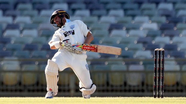 NSW batsman Ed Cowan avoids a bouncer on day 2 of the Shield match against Western Australia at the WACA.