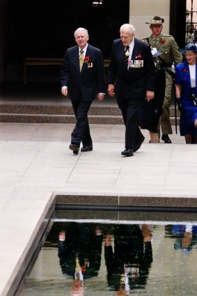 The Governor-General Sir William Deane and Chair of the Australian War Memorial Major-General  William 'Digger'  James walking to the Tomb of the Unknown Soldier at the Australian War Memorial in Canberra in 2000.