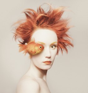 Photographer Flora Borsi's self-portrait with a goldfish. 